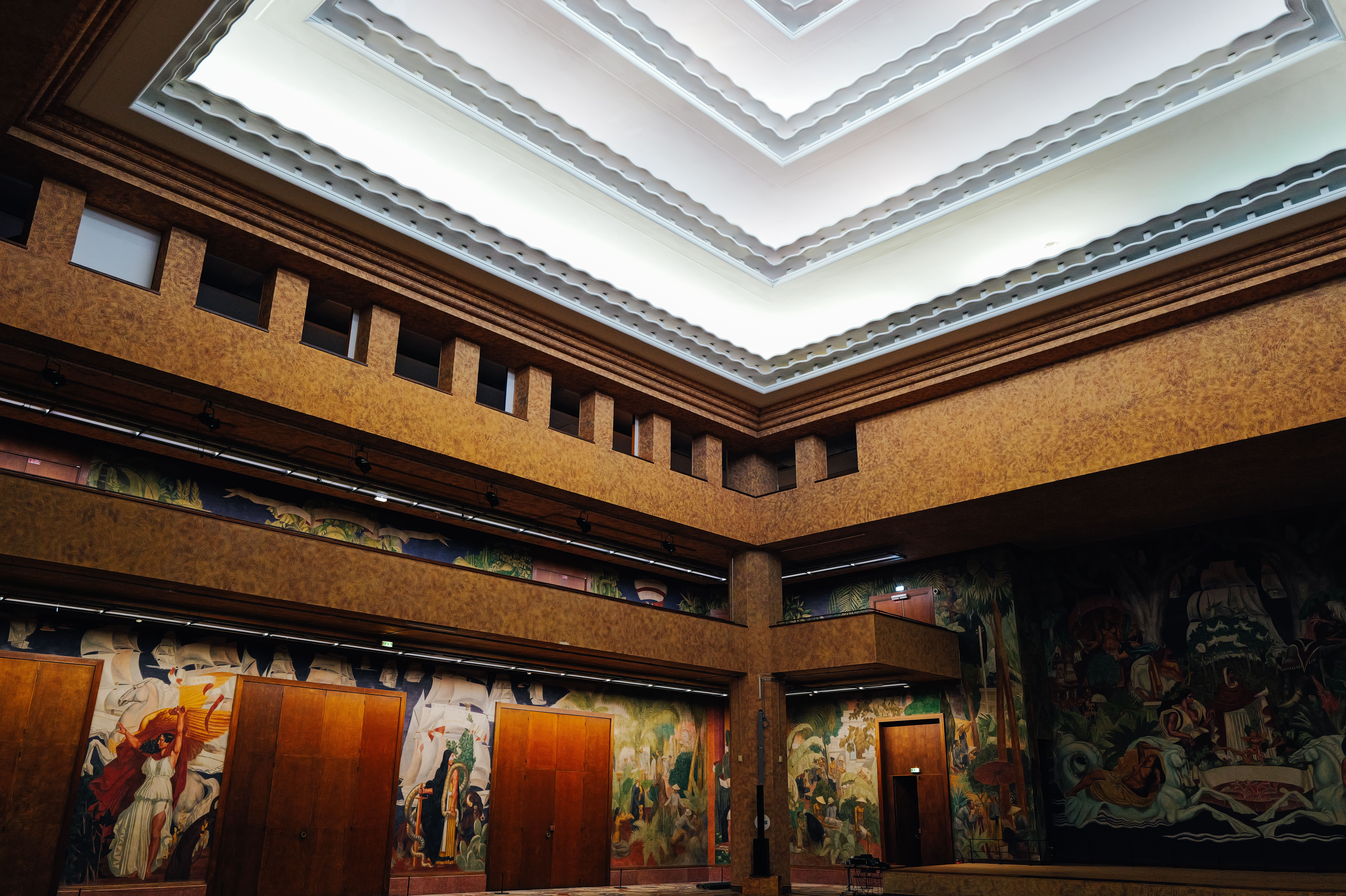 A sophisticated minimalist art gallery showcasing a rare masterwork under precise architectural lighting.