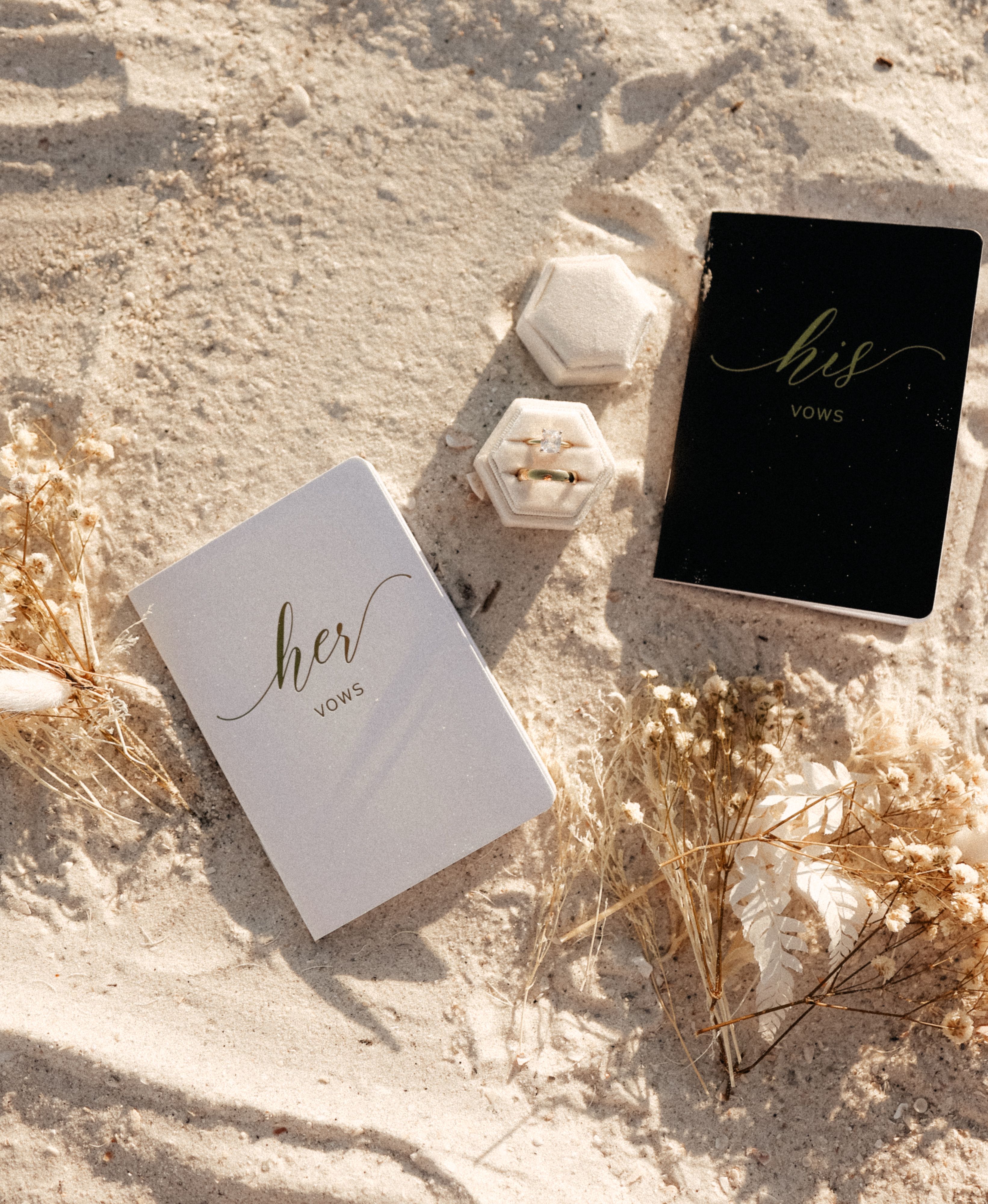 Wedding vow books on the beach