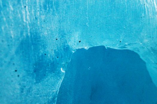 Detailed shot of a beautiful blue ice formation showcasing natural textures.. detailed, shot, beautiful