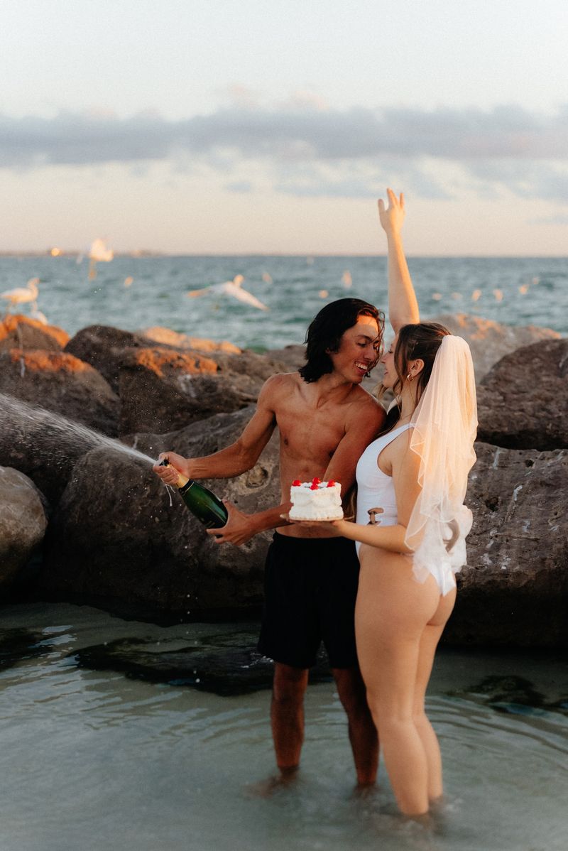 Wedding couple at the Olivers Hill lookout in Frankston with panoramic views across Port Phillip Bay at sunset