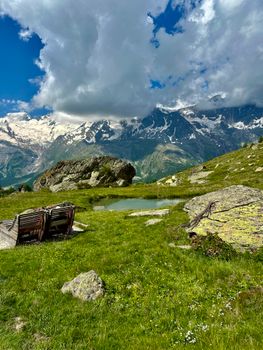 Beautiful alpine scene with rocks and lake in Saas-Grund, Switzerland.