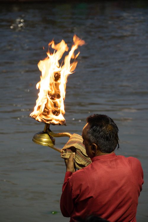Free Experience the spiritual essence of the Ganga Aarti ritual by the river in Haridwar, India. Stock Photo