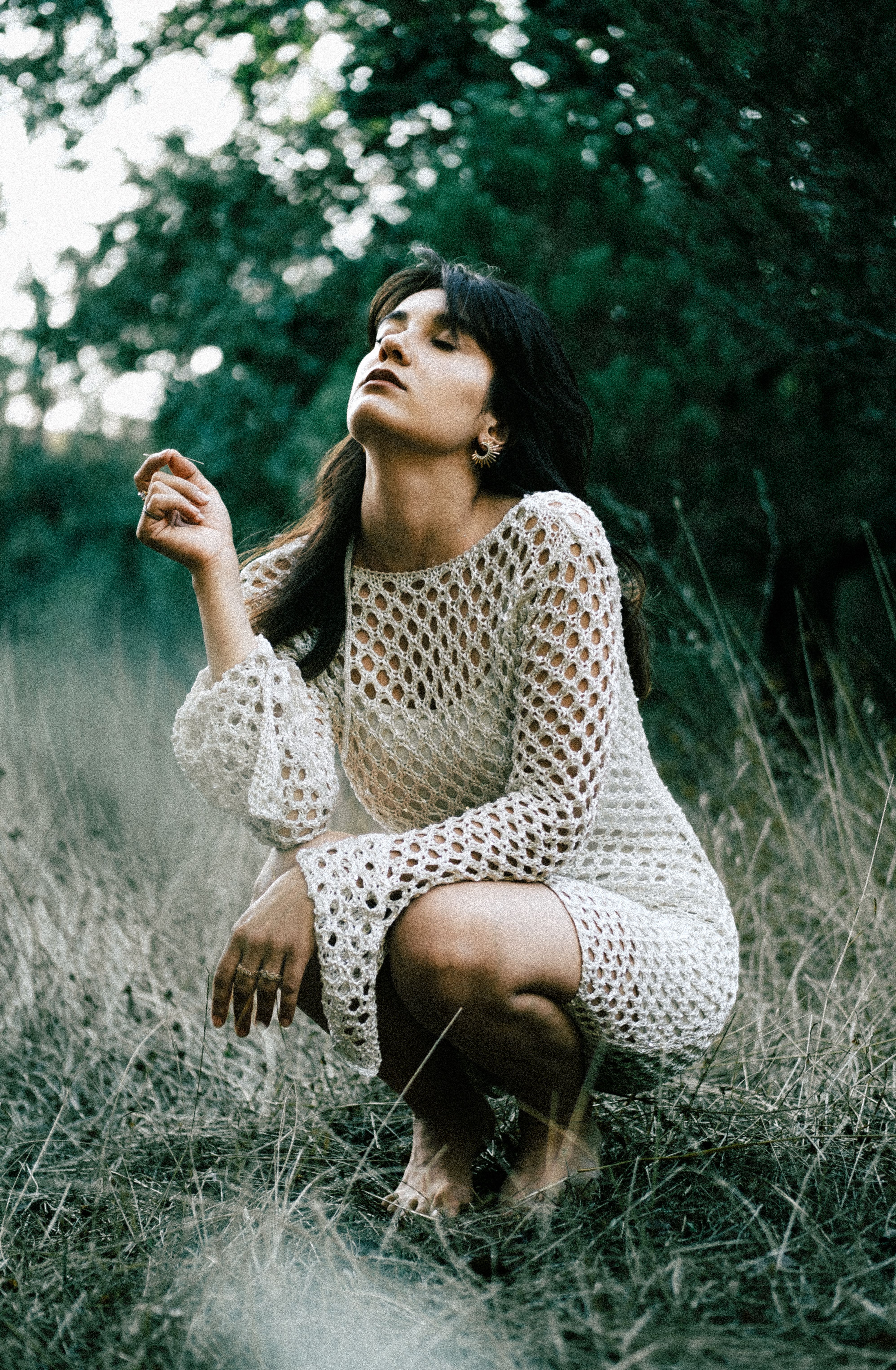 Photo Of Woman Sitting On Ground · Free Stock Photo