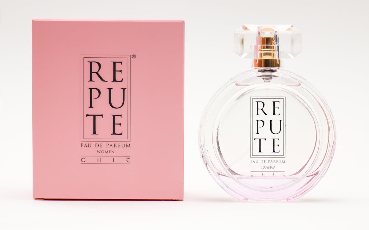 High-quality photo of Repute perfume bottle and packaging, showcasing luxury design.