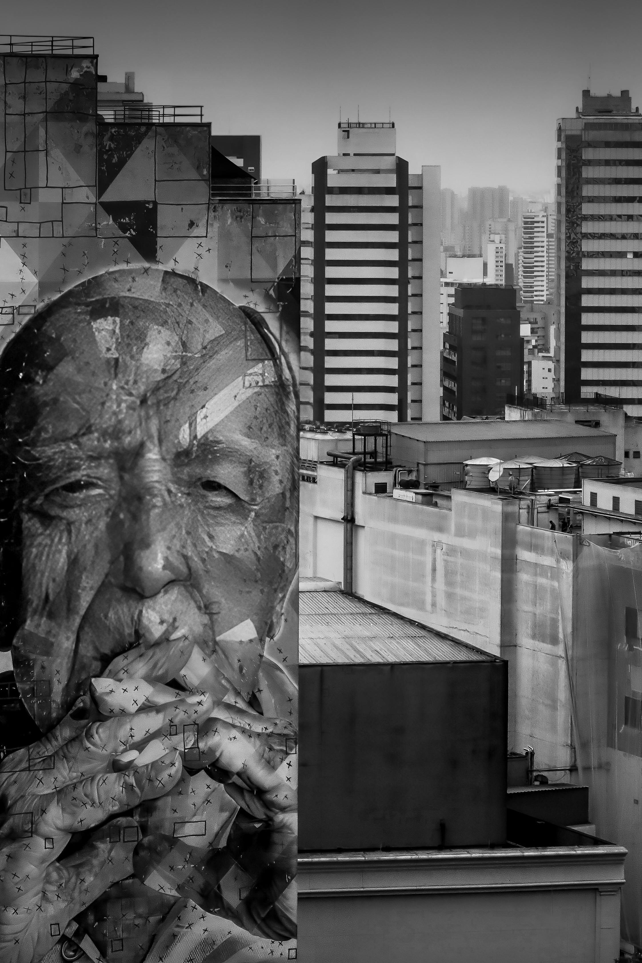 Black and white image of a large mural and urban city skyline in the background.