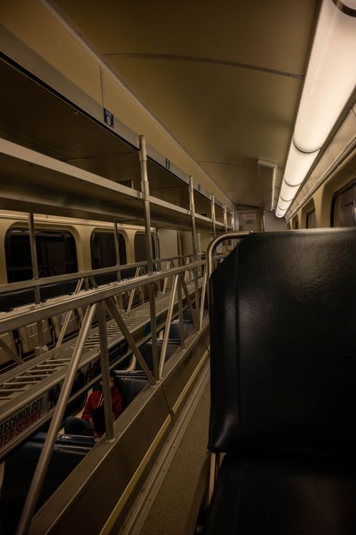 Inside A Train Auto Rack Seat on Train · Free Stock Photo