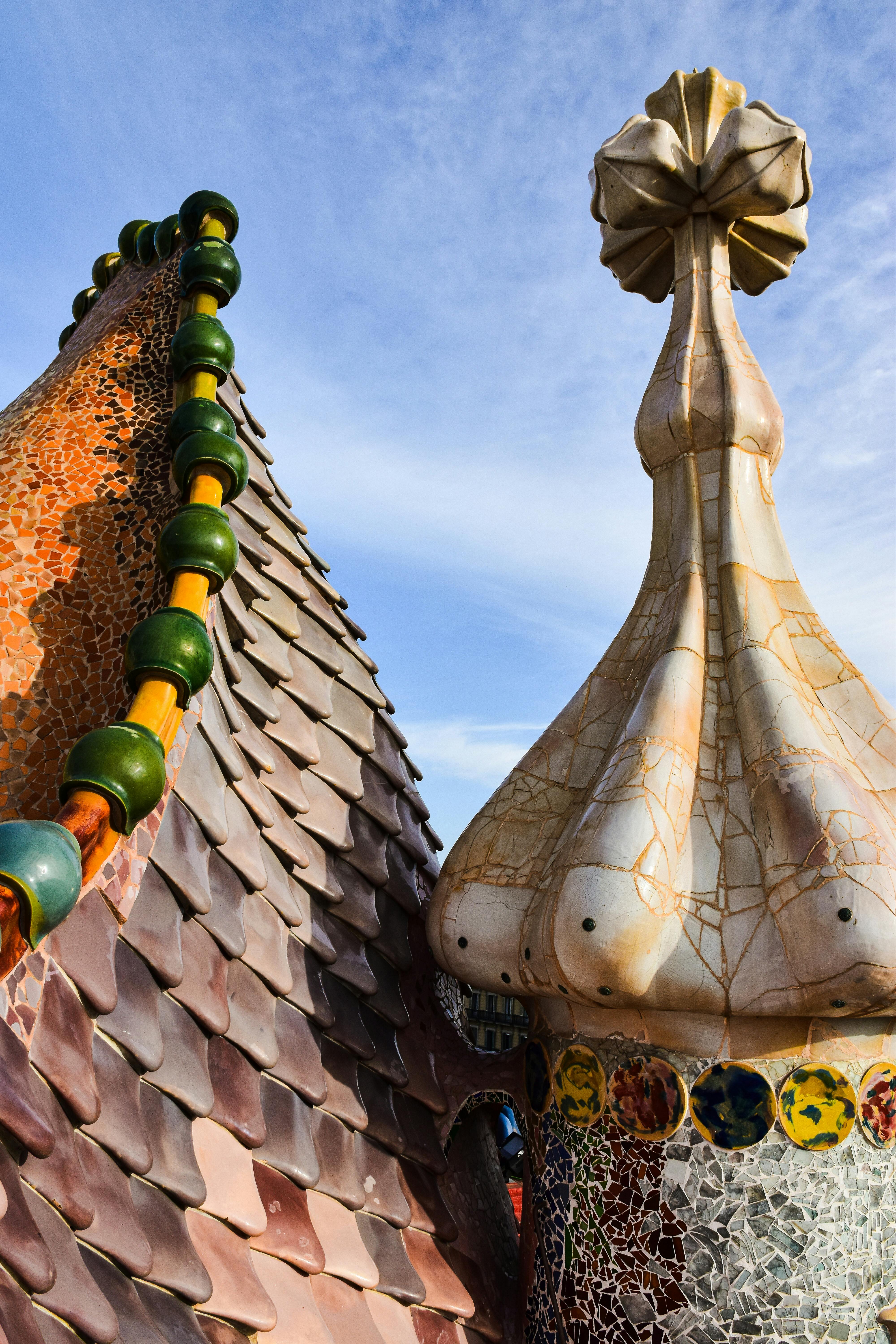 the roof of a building with colorful tiles