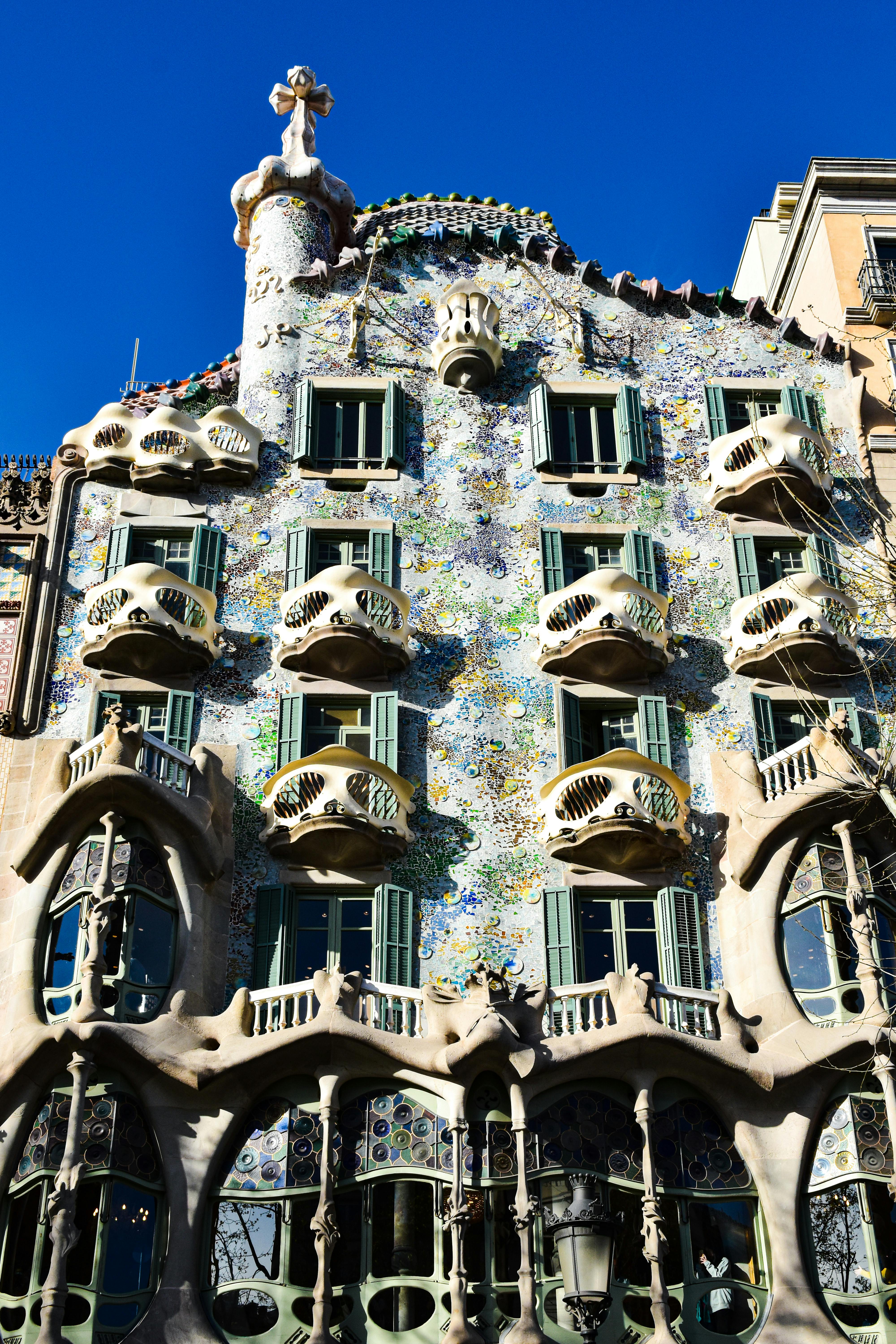 the building is made of many windows and balconies