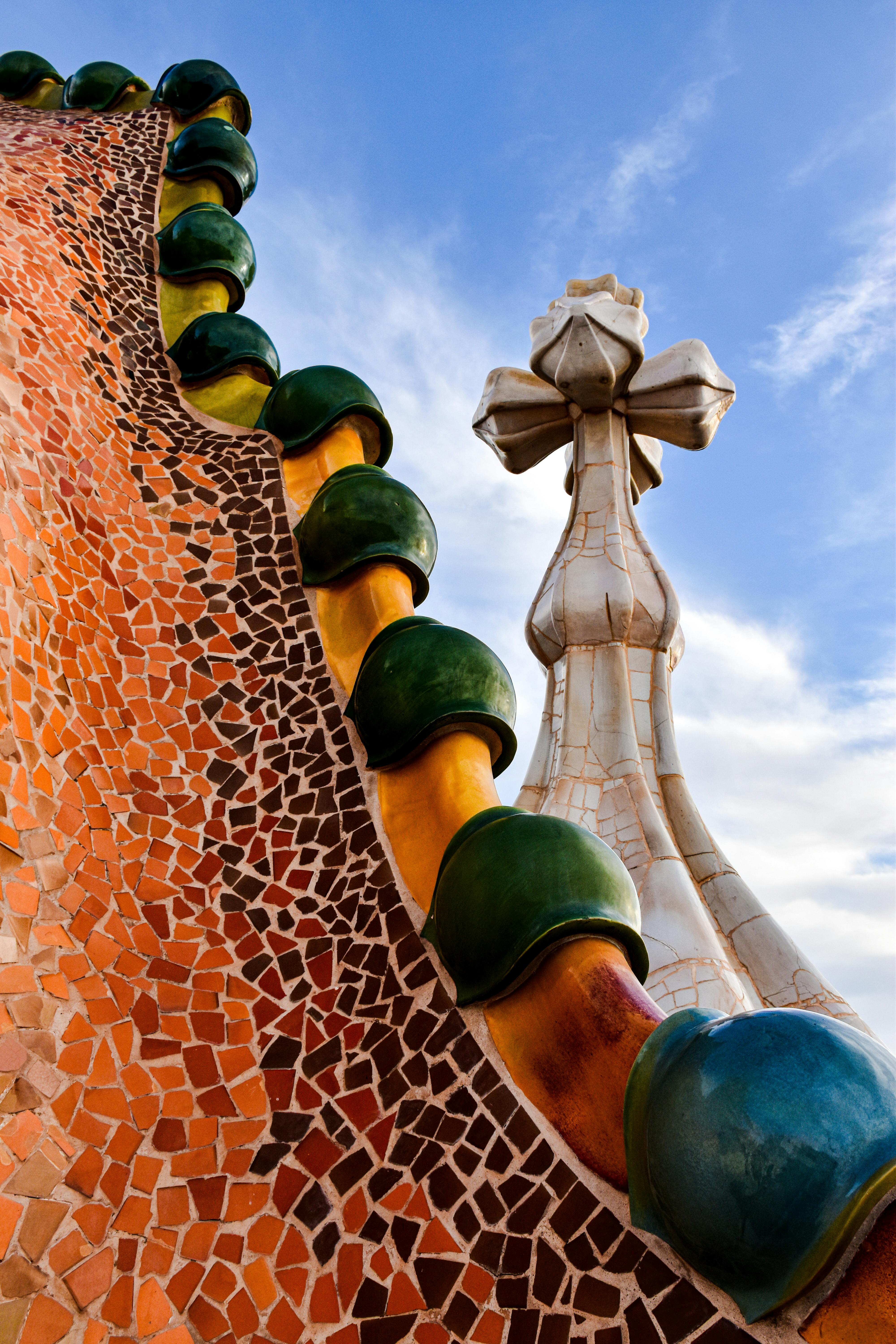 the roof of a building with colorful tiles