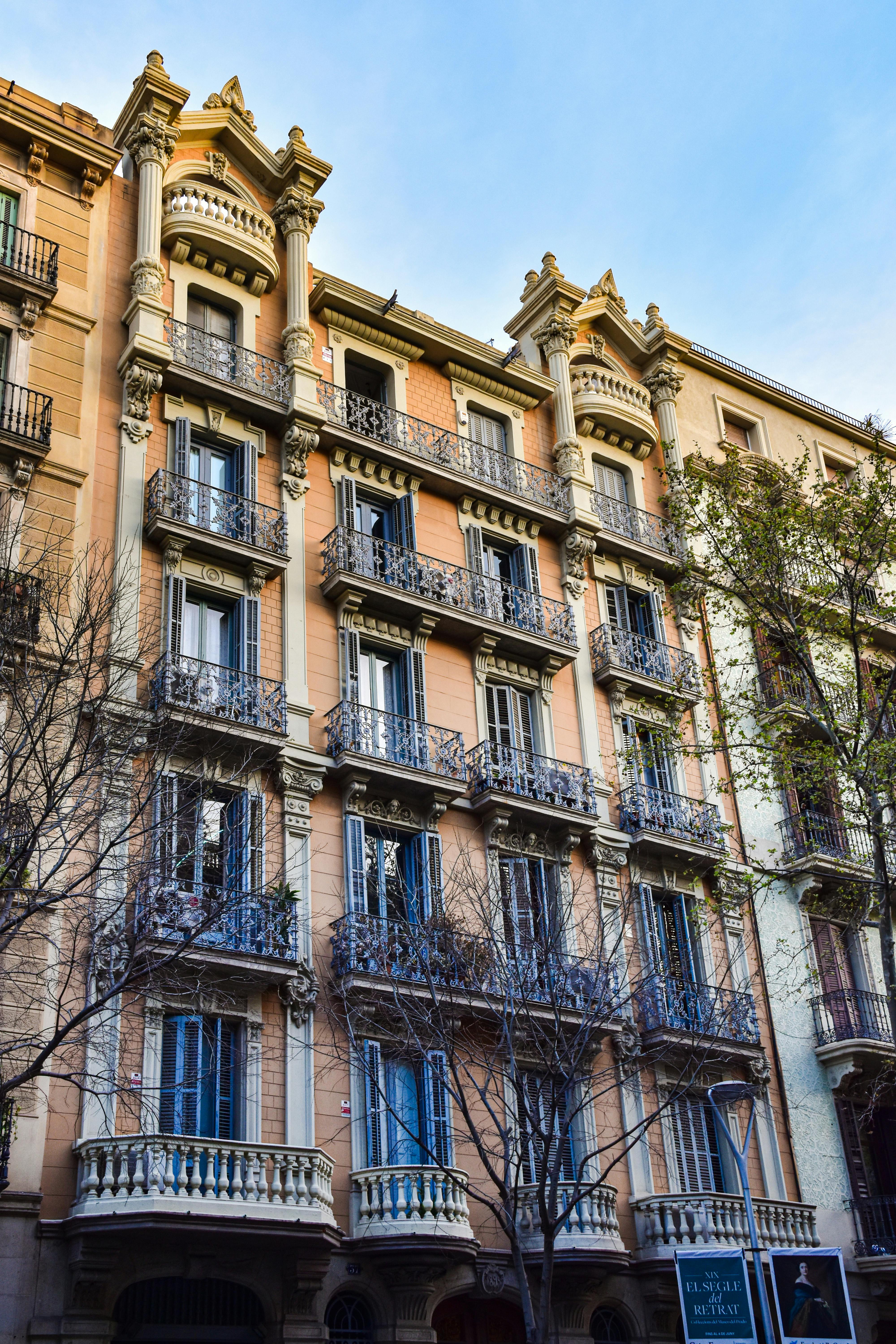 a building with balconies and balconies on the side