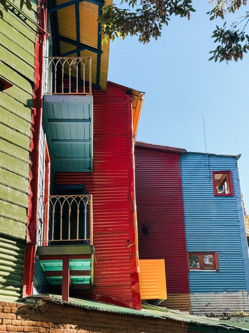 Free Bright wooden houses in La Boca, Buenos Aires, showcase vibrant colors and traditional architecture. Stock Photo