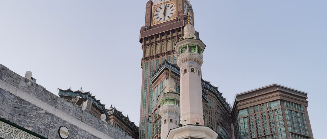 View of the iconic Abraj Al Bait and Mecca Clock Tower with surrounding architecture., Makkah, Saudi Arabia, stay connected here with a travel eSIM