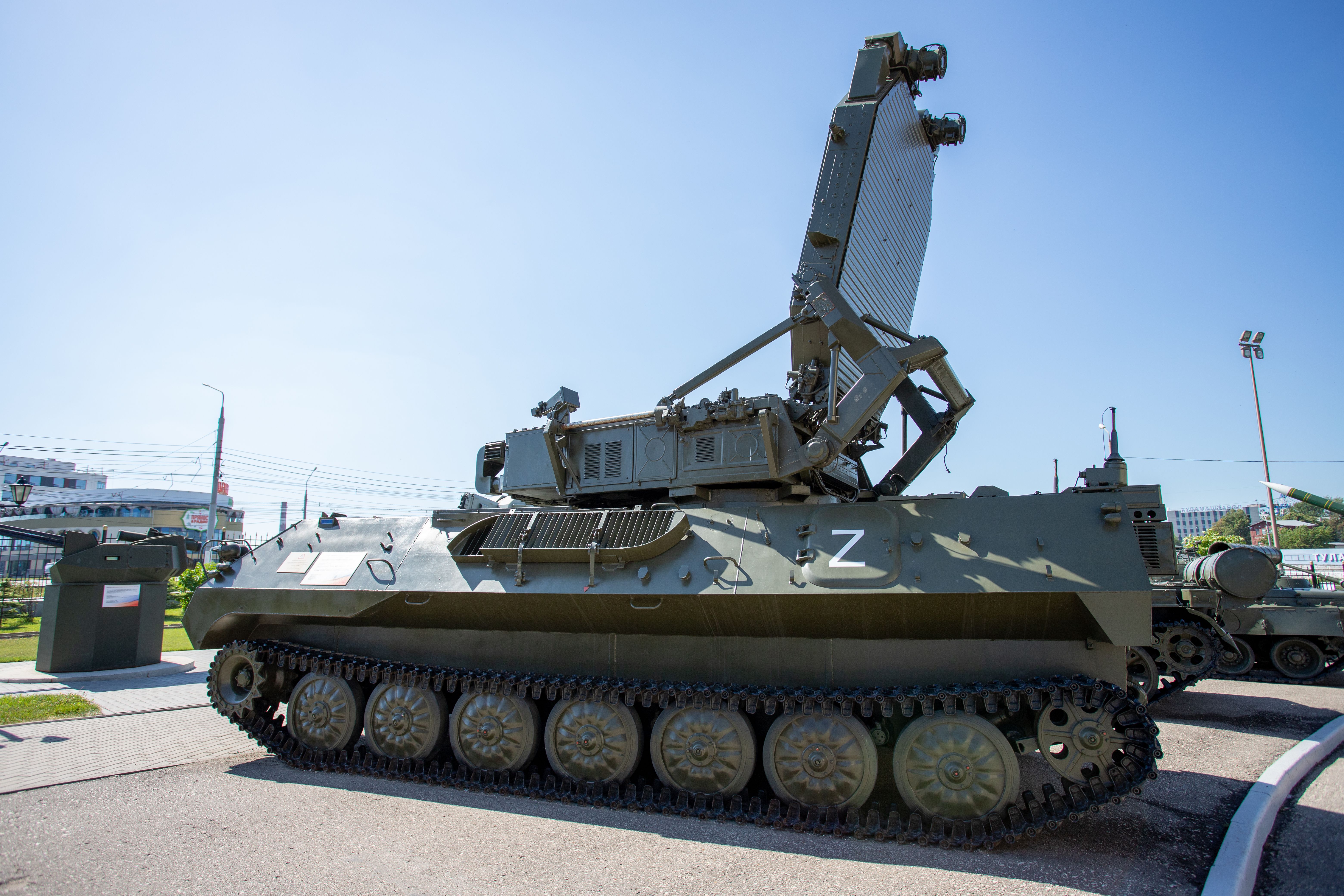 A military vehicle with a large gun on top · Free Stock Photo