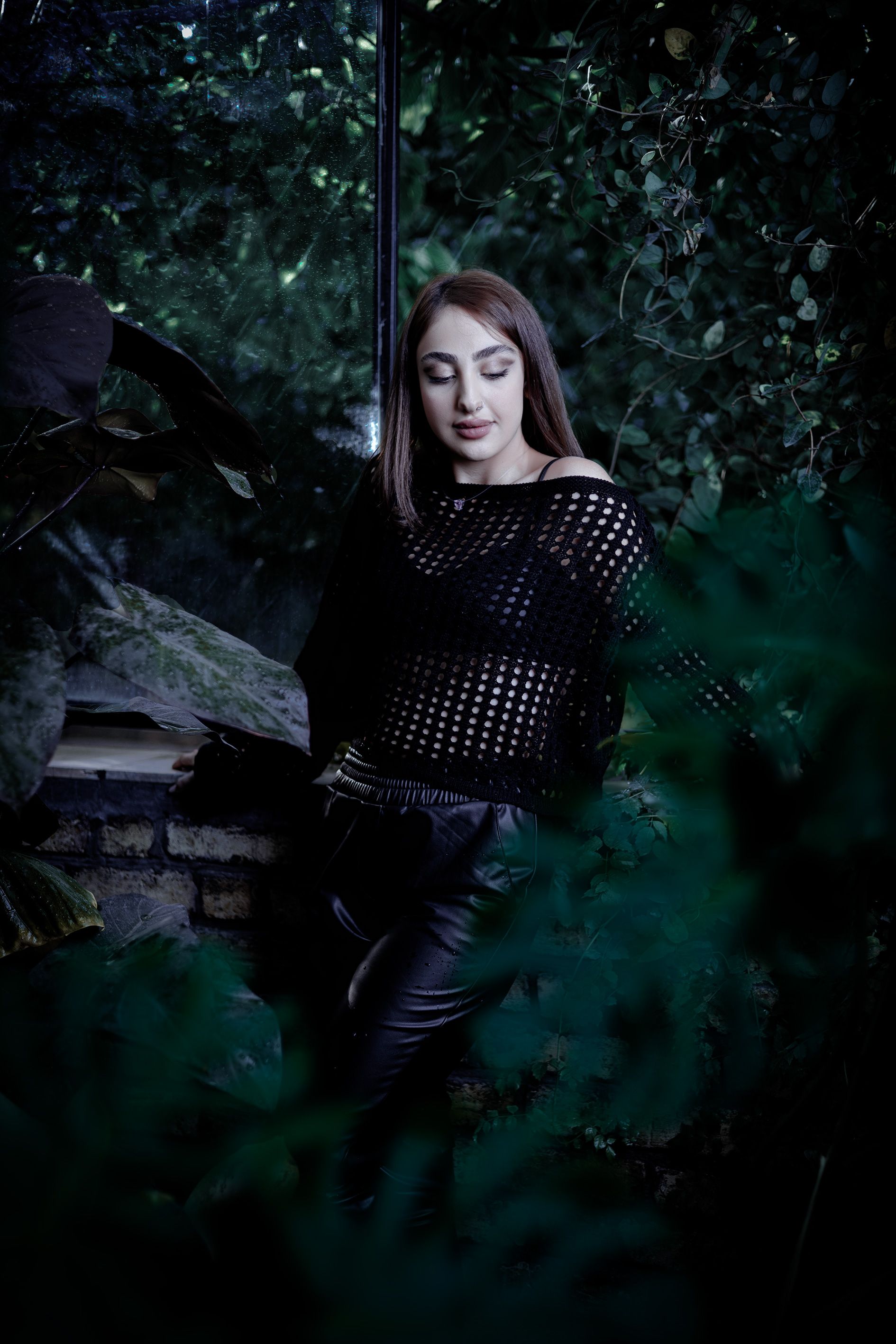 A woman in black leather pants and a black top · Free Stock Photo