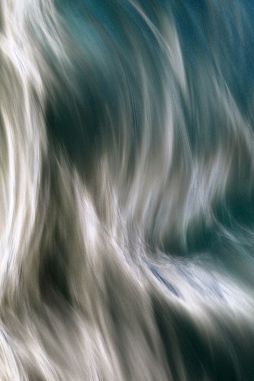 Free Abstract close-up of a waterfall with motion blur, capturing dynamic flow and energy. Stock Photo