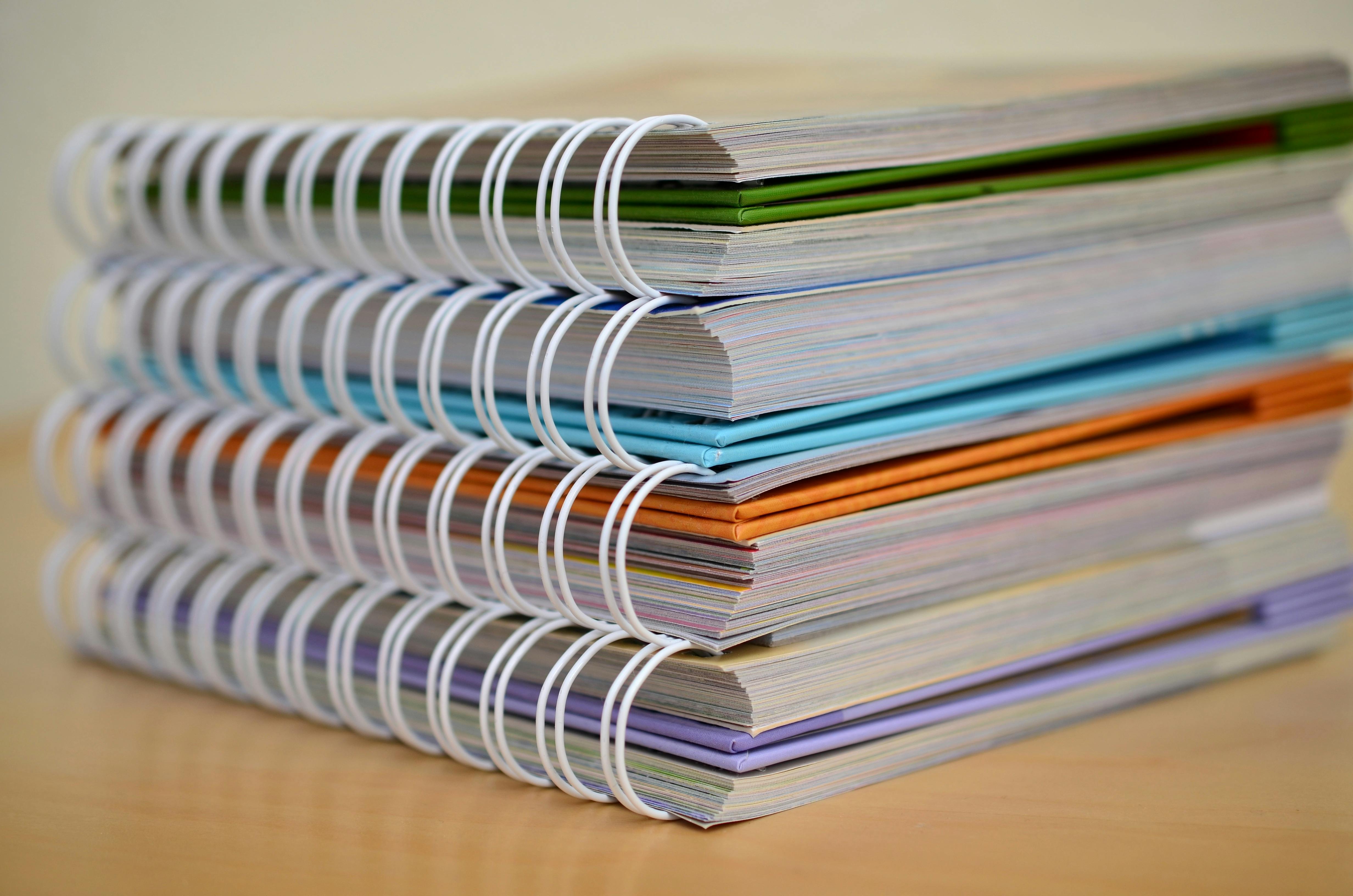 spiral notebooks.