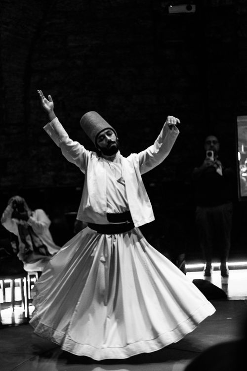Free Captivating black and white image of a Whirling Dervish dancer performing in Istanbul. Stock Photo