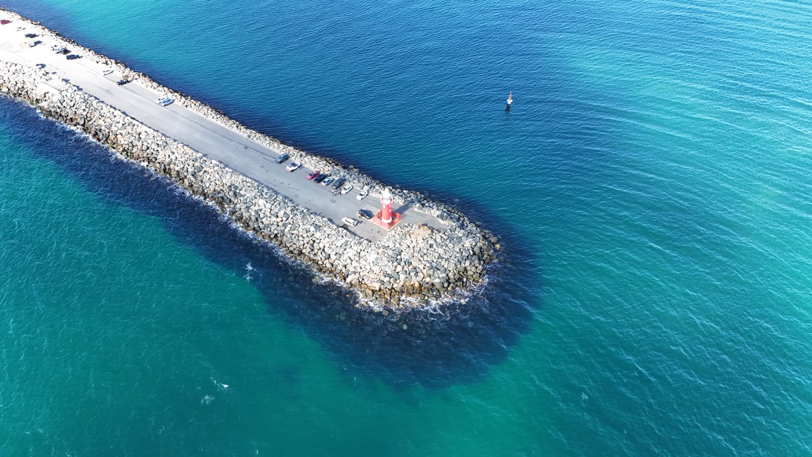 Aerial view of the jetty and clear water at Bathers Beach, Fremantle, a free Father's Day stop