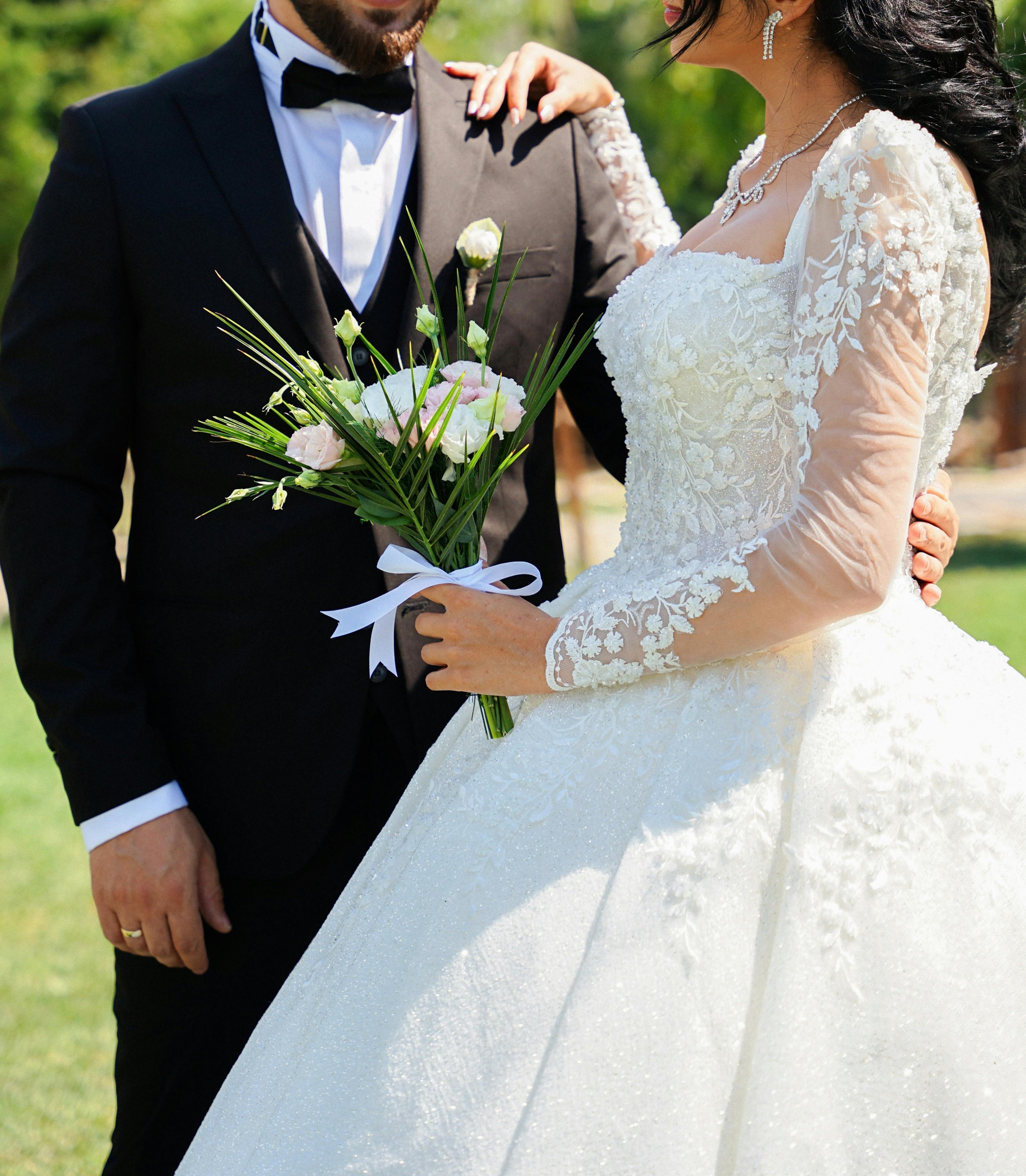 Woman Wearing White Wedding Dress And Man Wearing Black Suit · Free ...