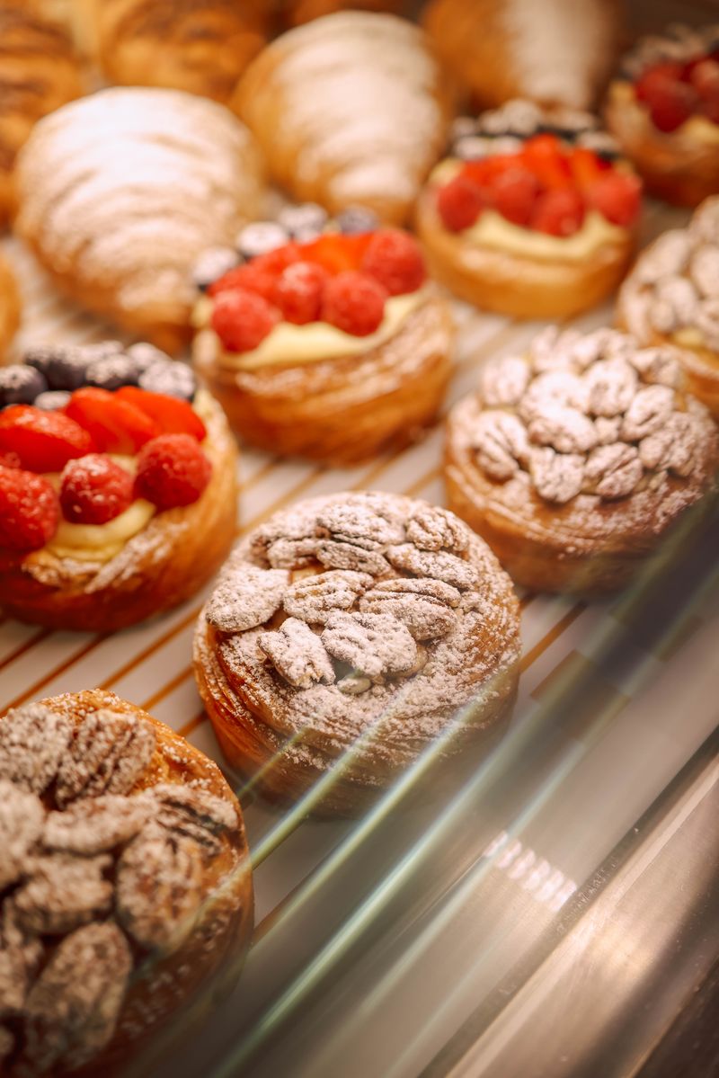 Display case of pastries and fruit