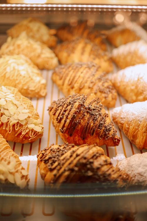 Free Mouthwatering pastries with various toppings, perfect for breakfast or dessert. Stock Photo