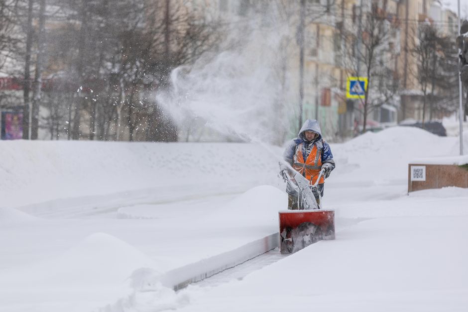 Snow removal equipment in action - commercial snow removal insurance