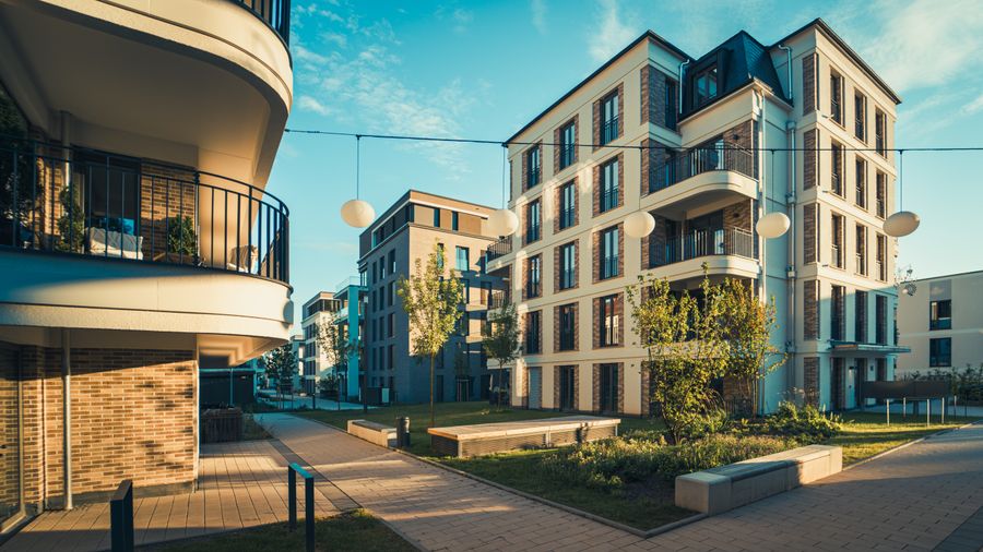 Modern apartment building with balconies, representative of Lume Residences, JVC
