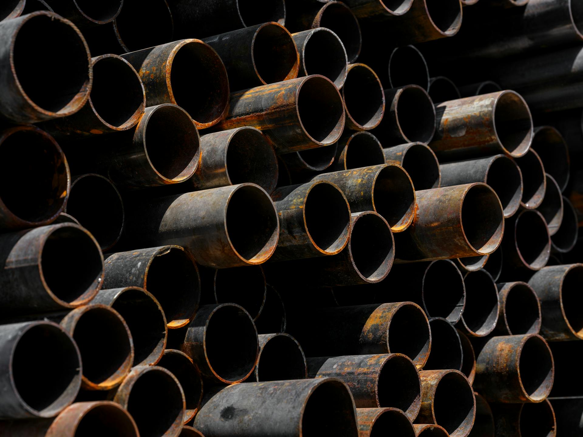 old rusty pipes in the junkyard