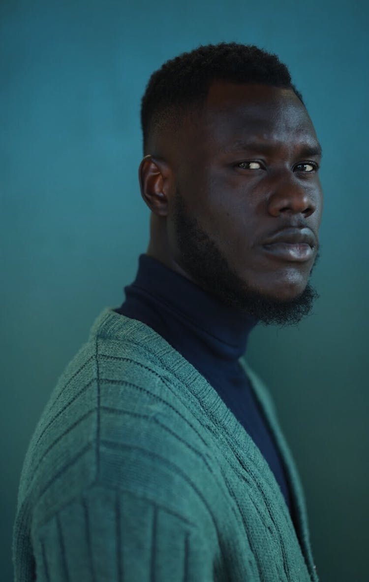 Photo Of Man Wearing Green Cardigan