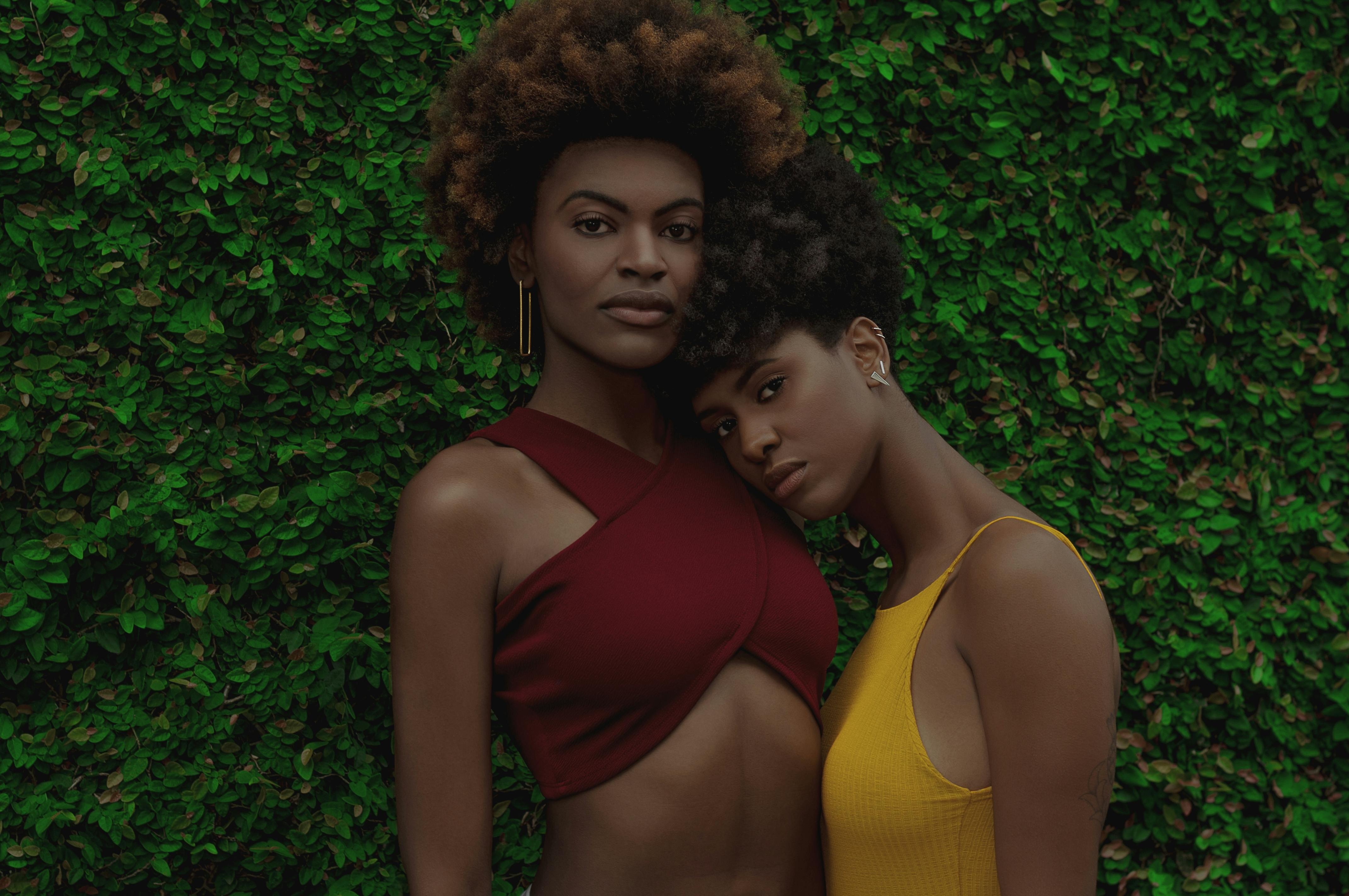 women standing near wall