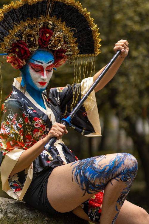 Free Vibrant portrait of a geisha-inspired performer in Mexico City with elaborate makeup and costume. Stock Photo