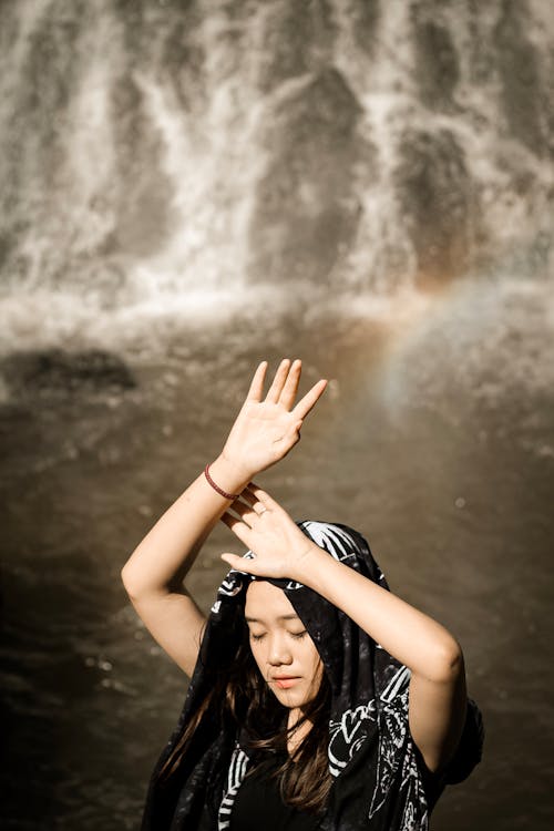 Photo Of Woman Raising Her Hands