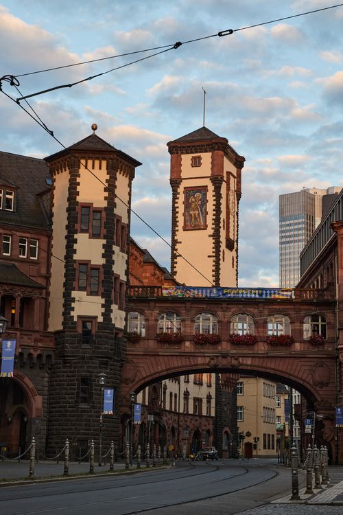 A clock tower is on the side of a building · Free Stock Photo