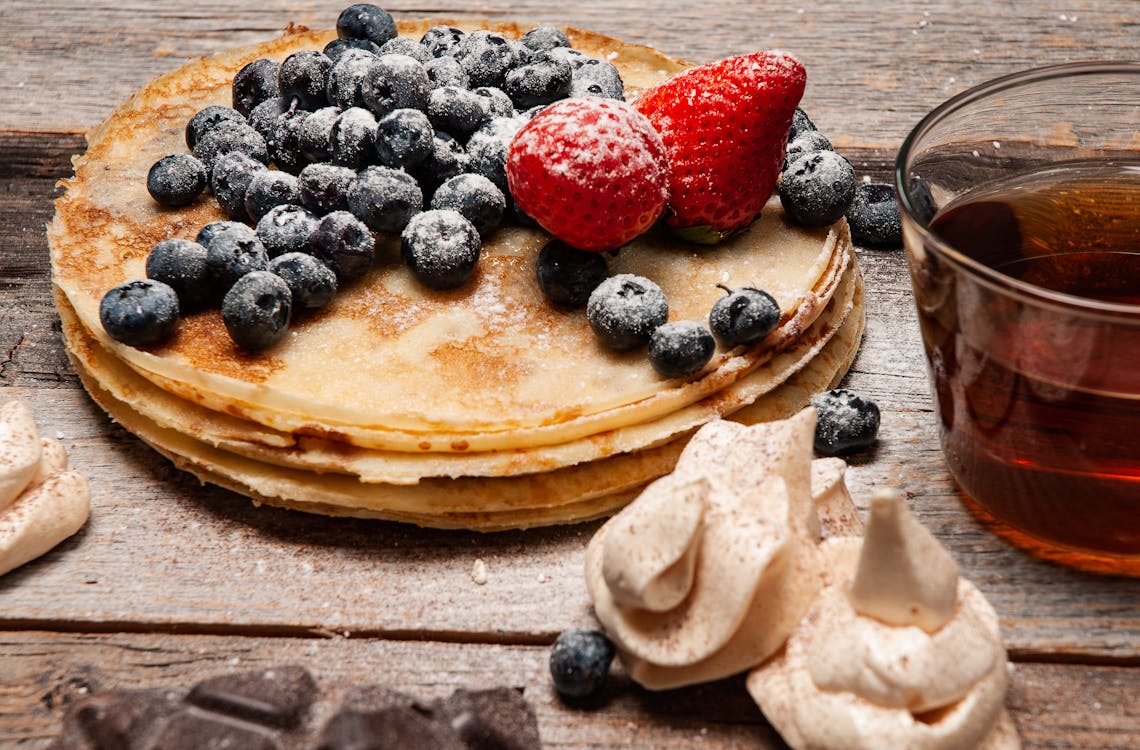 Free Pancakes With Strawberries and Blueberries On Top Stock Photo