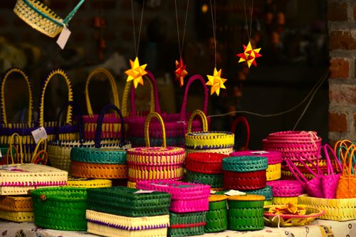Free Colorful handmade baskets at a street market in Chennai, India, showcasing traditional craftsmanship. Stock Photo