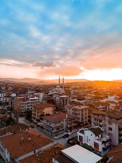 Free Stunning aerial photo of Yalova cityscape with sunset sky and urban architecture. Stock Photo