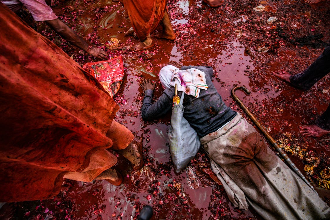 Woman Facing Down During Holi Festival