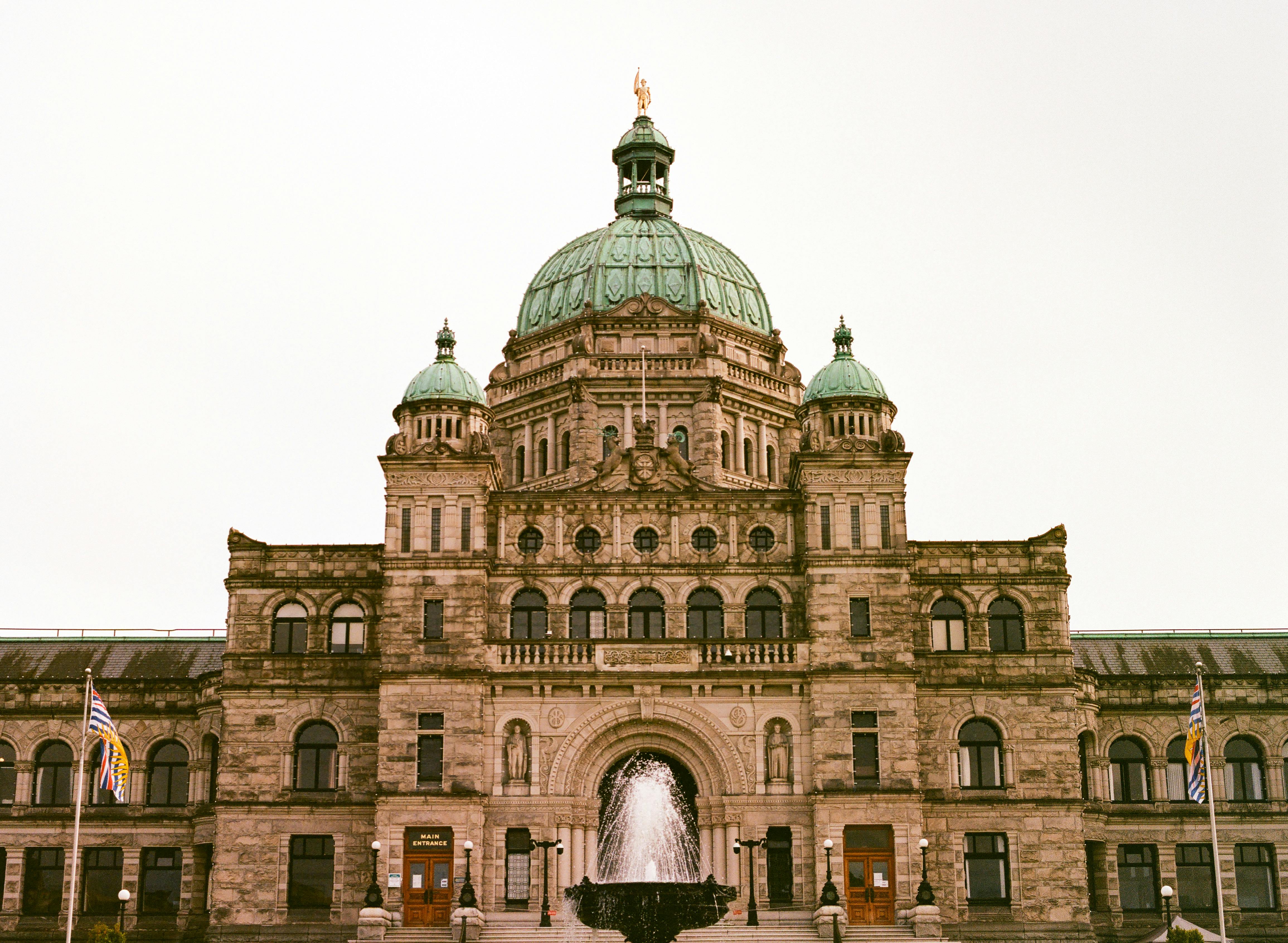 A library of law books, representing the legal and regulatory frameworks.