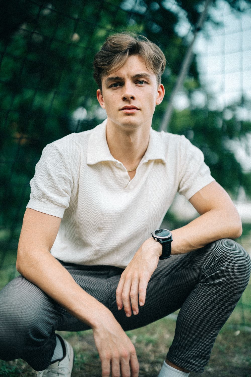 Portrait of a Man Crouching · Free Stock Photo