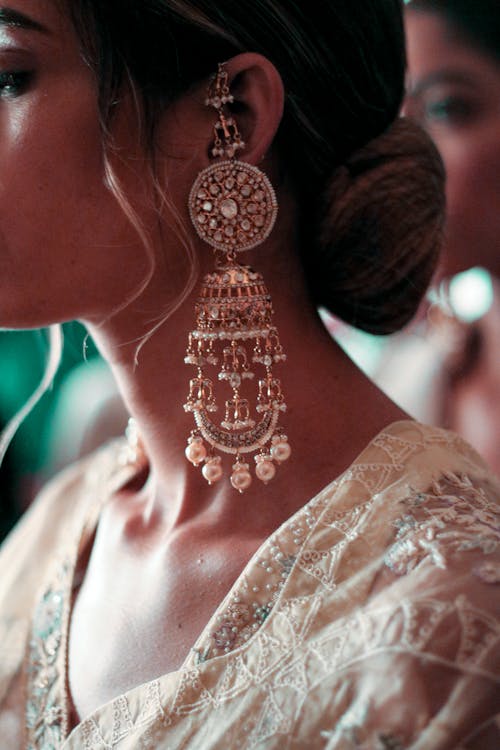 Close-Up Shot of a Woman Wearing an Earring