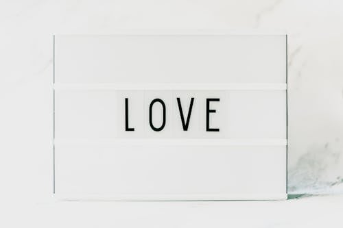 Black Love Text on White Background