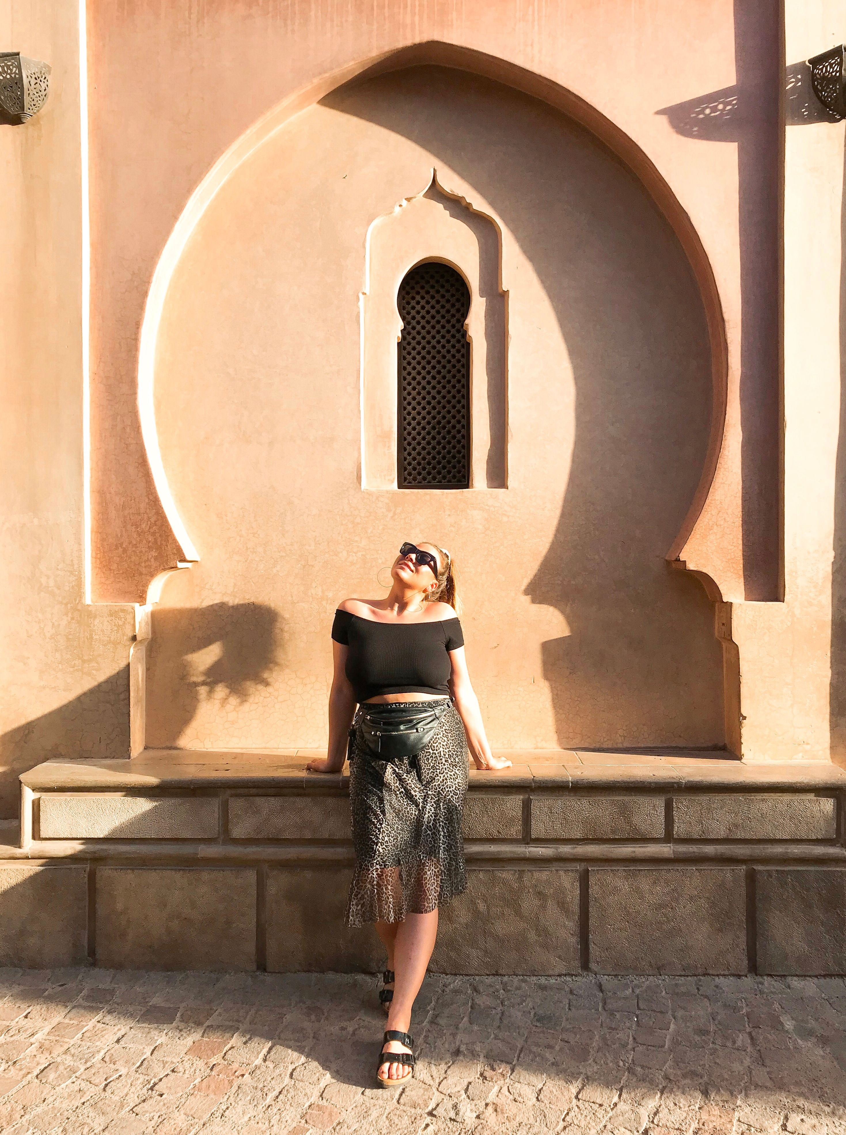 Photo of a Woman in Black Top and Black Skirt · Free Stock Photo