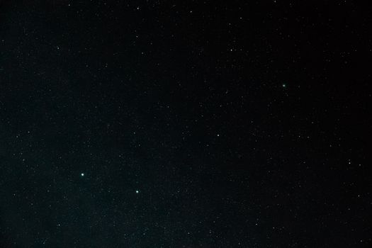 A serene view of the starry night sky in Caeté-Açu, showcasing galaxies and constellations.