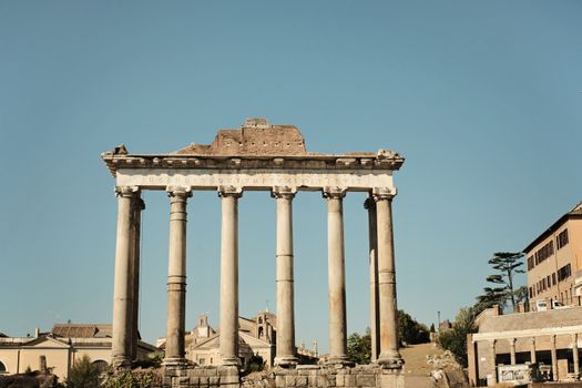 Beautiful ancient Roman columns in the heart of historic Rome on a sunny day.