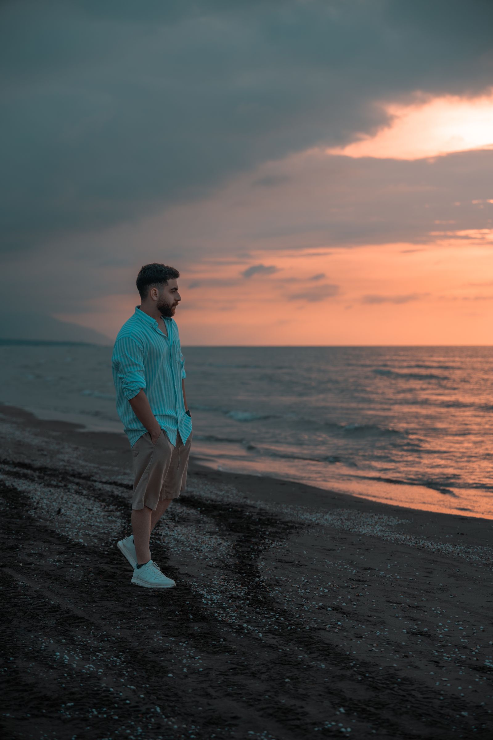 Man Standing Near Body of Water · Free Stock Photo