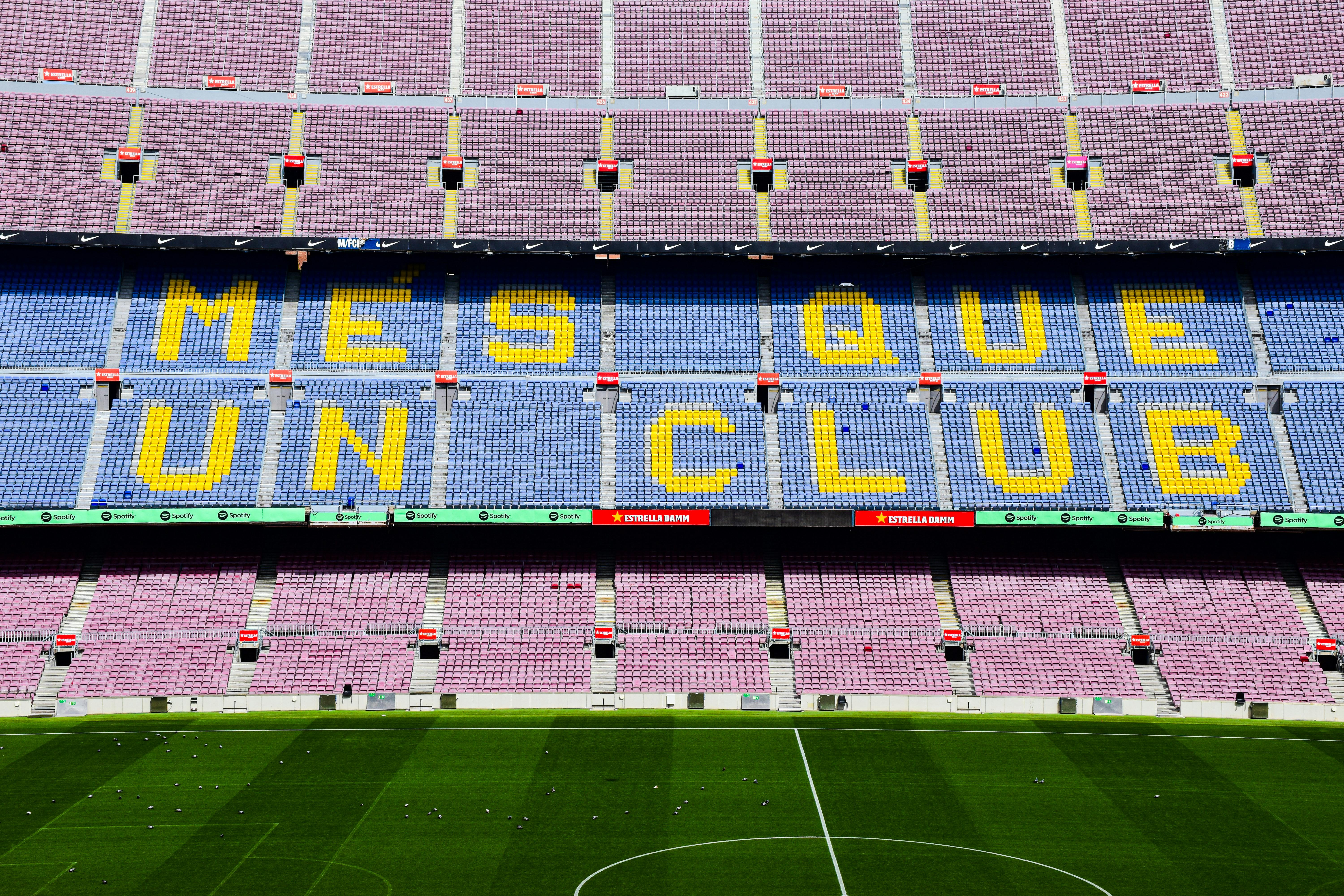 the words are written on the wall of a soccer stadium