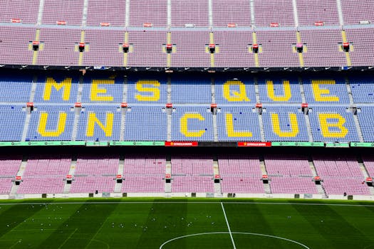 The iconic "Mes Que Un Club" slogan displayed at the Camp Nou stadium in Barcelona, Spain.