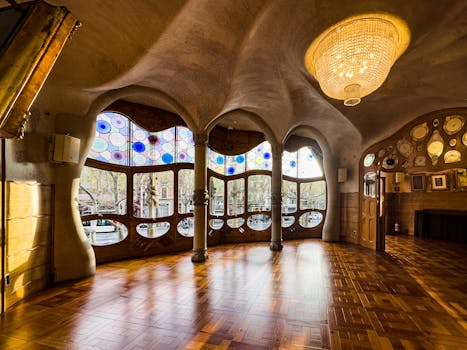 Ornate interior of Casa Batlló in Barcelona showcasing Gaudí's unique architecture.