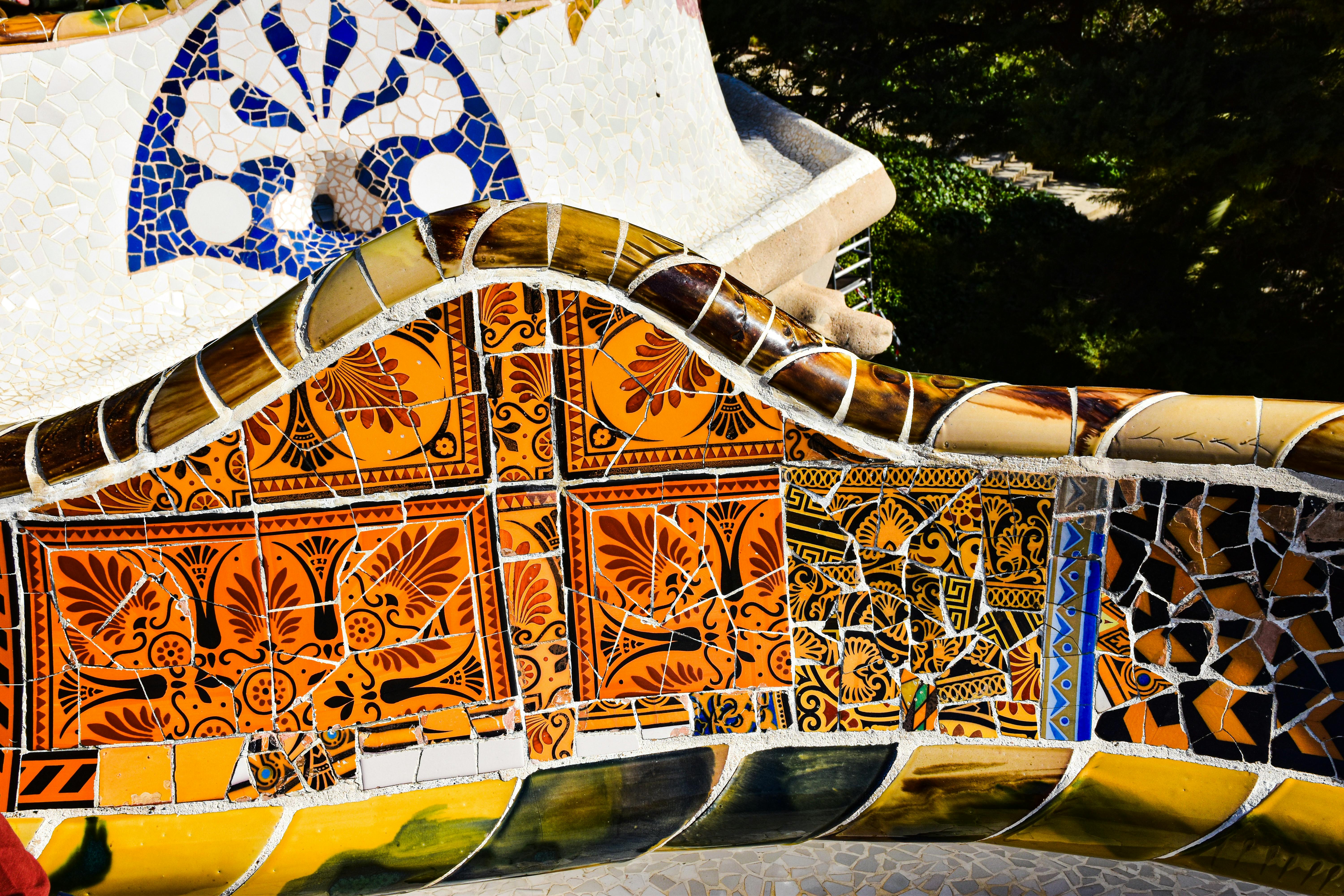 a close up of a decorative bench with colorful designs