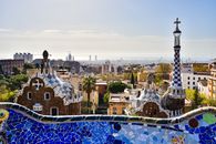 A stunning cityscape of Barcelona from Park Güell, capturing unique architecture and vibrant urban life.
